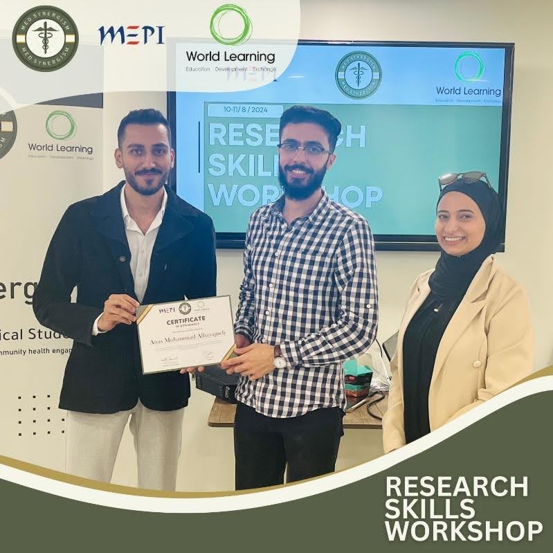 Mohammad Al Jamal (left) and Sadeen Sameer (right) give a Med Synergism Workshop certificate to a medical student participant.