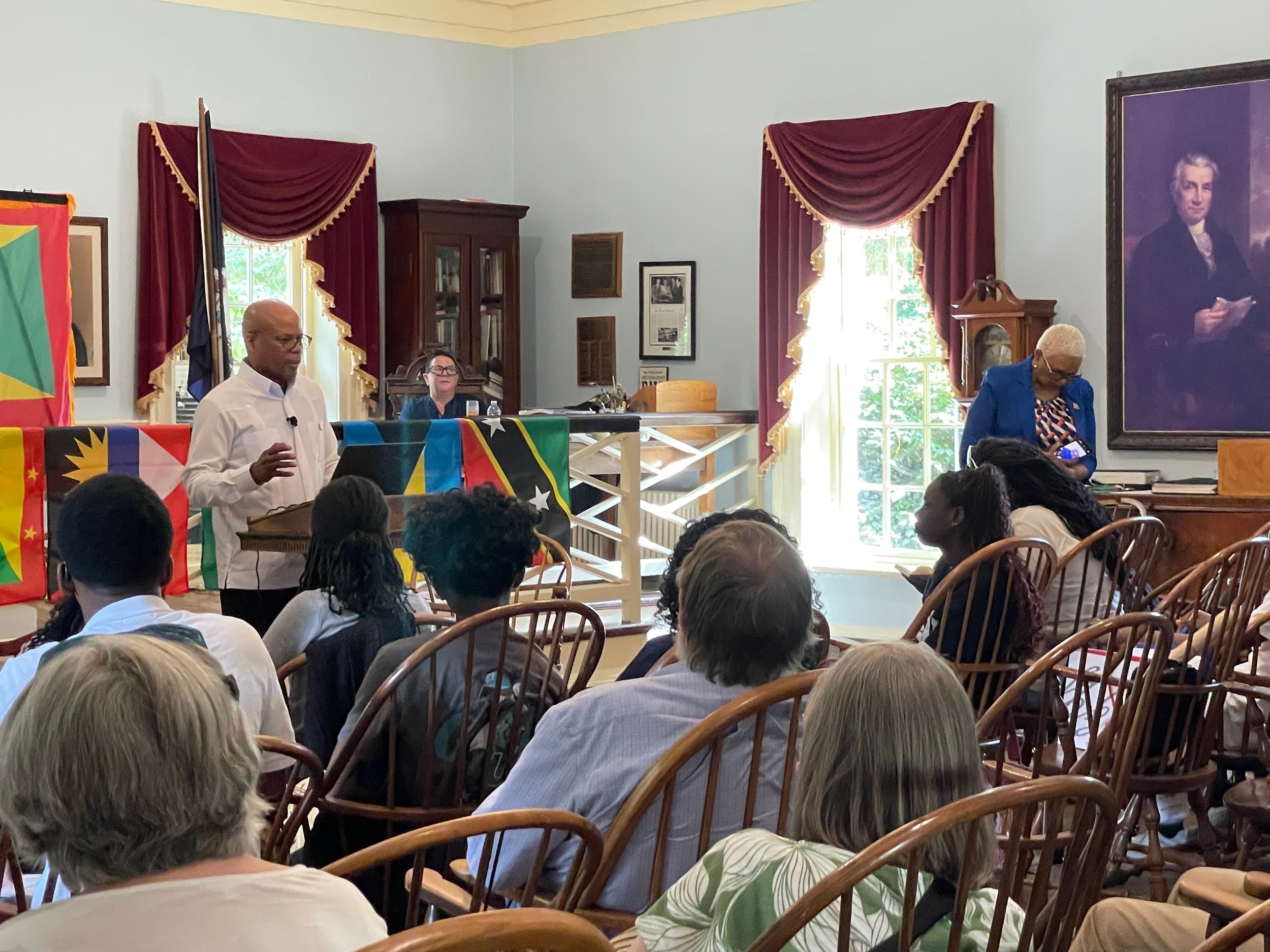 Youth Ambassadors in Charlottesville, Virginia, attend a talk with Granada's Ambassador Tarlie Francis.