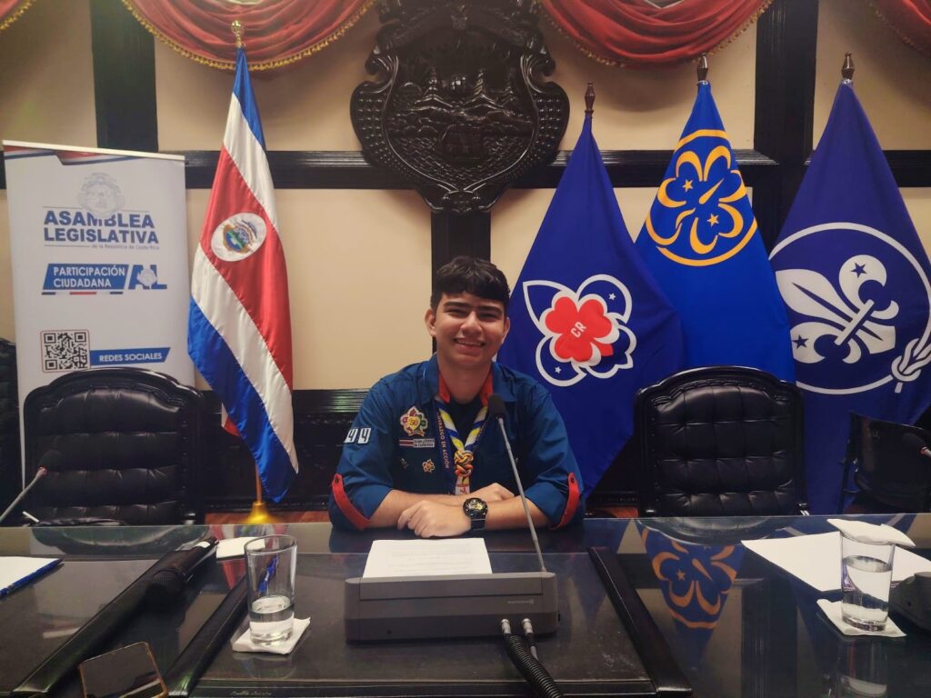 Josimar Madrigal wearing his official Costa Rican Scout uniform while participating in a youth leadership event.
